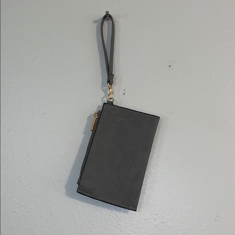 ⭐️ a new day grey and gold wristlet
